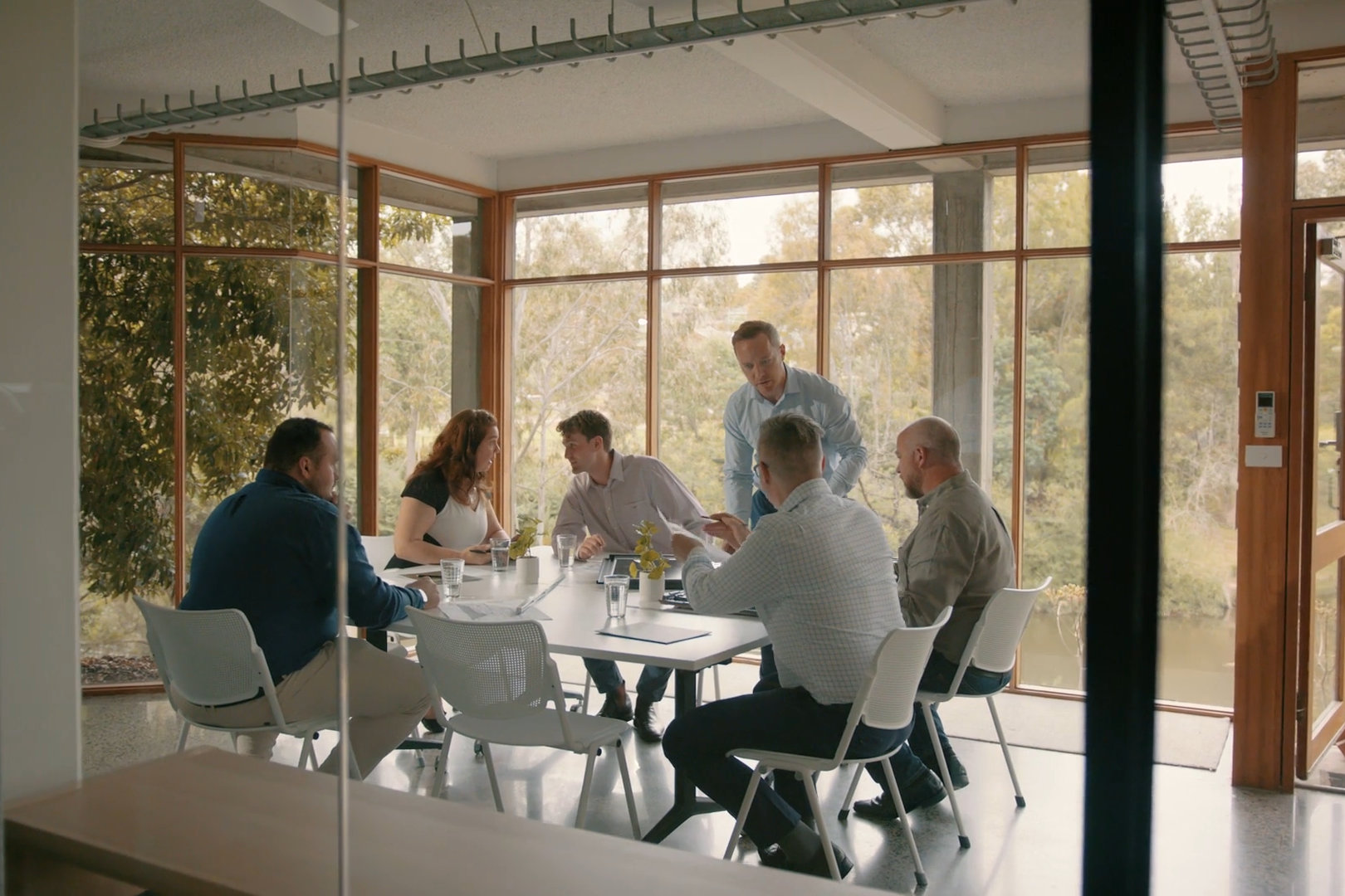 The Volt team working through a project around the boardroom table